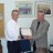Lion Butch Lima (left) receiving the Melvin Jones Fellowship from Mount Seymour Lions Club President Lion Dave Mair